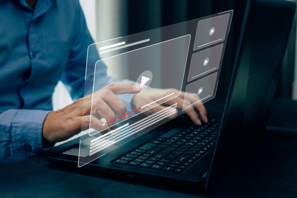 istock Businessman hands using laptop for streaming online, watching video on internet. 1368151419