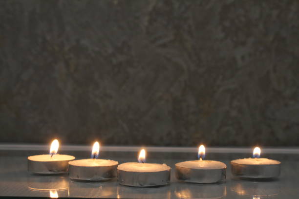 istock five small candles burn and stand in a triangle. side view. Divination Halloween Mystic 1368159276