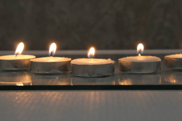 istock five small candles burn and stand in a triangle. side view. Divination Halloween Mystic 1368159293