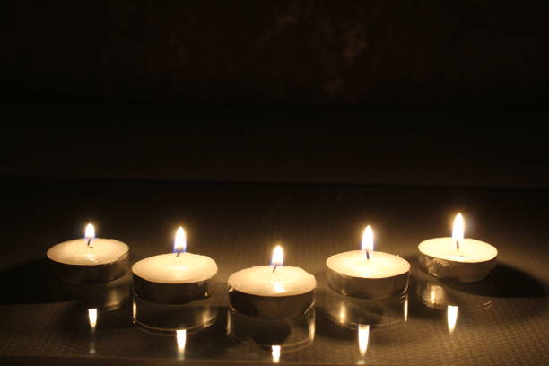 istock five small candles burn and stand in a triangle. side view. Divination Halloween Mystic 1368159336