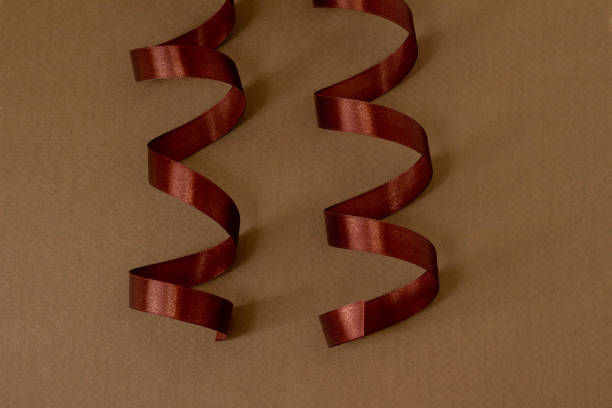 istock Image of a gift made of brown ribbon 1368160927