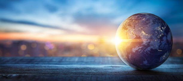 Planet Earth on the background of blurred lights of the city. Concept on business, politics, ecology and media. Earth day abstract background. Elements of this image furnished by NASA stock photo