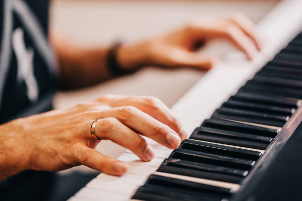 istock male pianist hands on the keys 1368164448