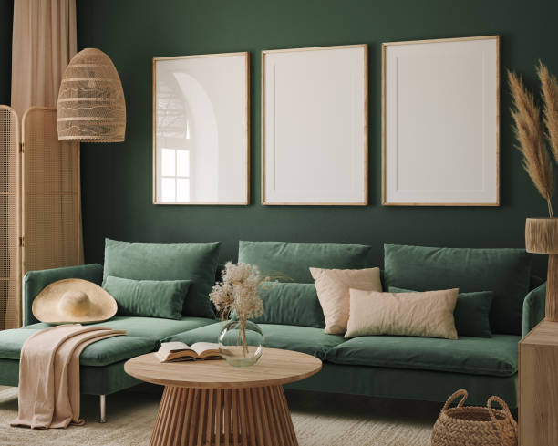 istock Home interior mock-up with green sofa, frames, table and decor in living room 1368167235