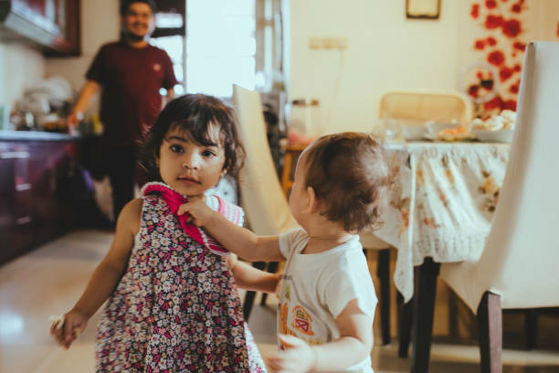 istock One year old babies in the house being rude 1368171466
