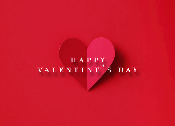 istock Valentine's Day Concept - Happy Valentine's Day Message Over A Folding Red Heart Shape Over Red Background 1368171878