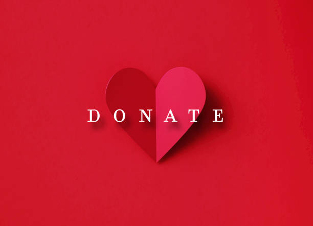 istock Donation Concept - Donate Message Over A Folding Red Heart Shape Over Red Background 1368172035