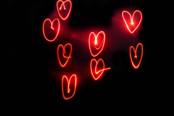istock Lots of Red Hearts written with red lights 1368172597