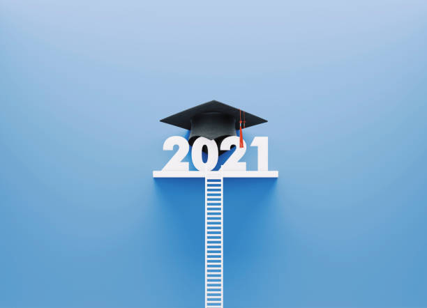istock White Ladder  and 2021 with A Graduation Cap Leaning on Blue Wall 1368172702