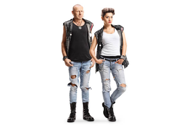 Young punk woman and a bald man posing isolated on white background