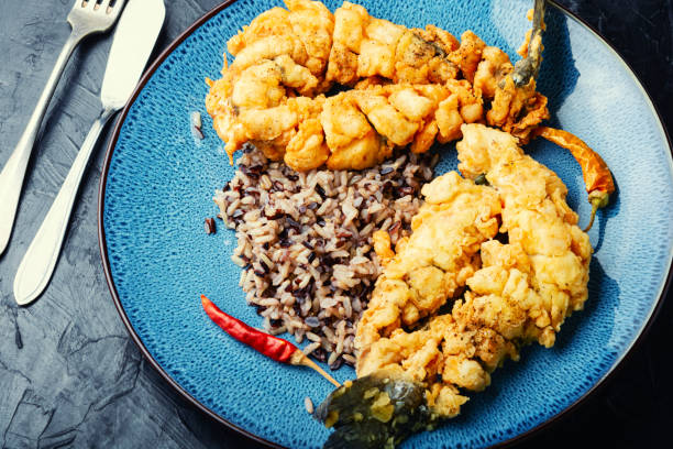 istock Appetizing fried sea bass fish, seafood 1368177527