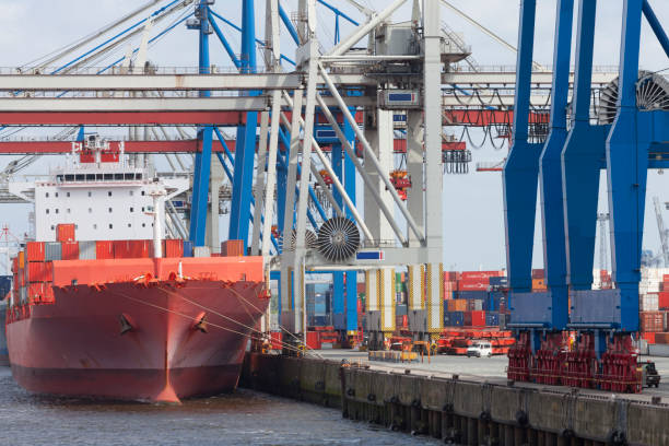 istock Container Ship Being Unloaded at Hamburg Harbor, Germany 1368177532
