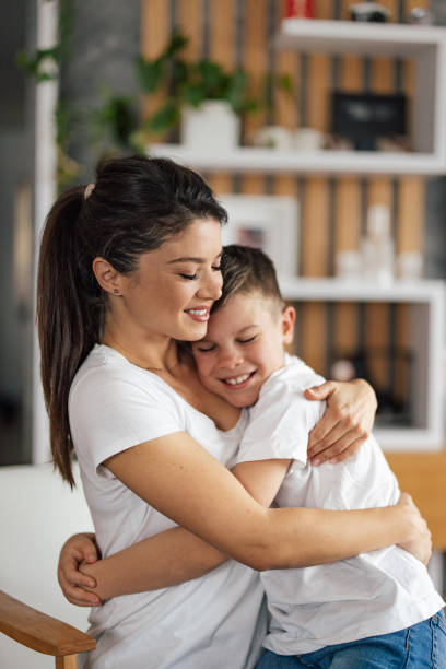 istock Mother and son enjoy together, hugging each other. 1368178742