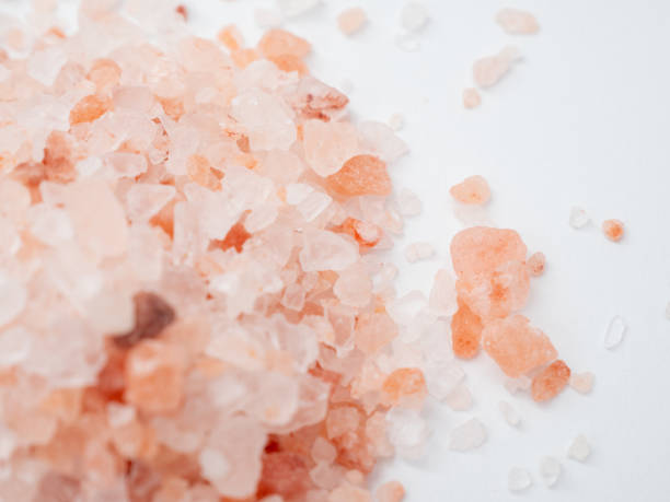 istock Pink salt on a white background 1368179181