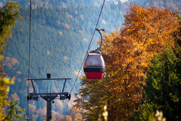 Gondola Lift on Jaworzyna Krynicka Mountain in autumn. Krynica-Zdroj, Poland. Gondola Lift on Jaworzyna Krynicka Mountain in autumn. Krynica-Zdroj, Poland. beskid mountains photos stock pictures, royalty-free photos & images
