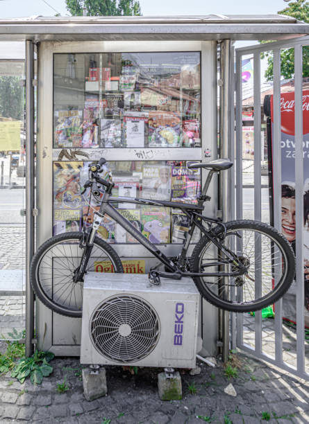Sarajevo, Bosnia and Herzegovina -July 08,2015: Bike parked over air-conditioning