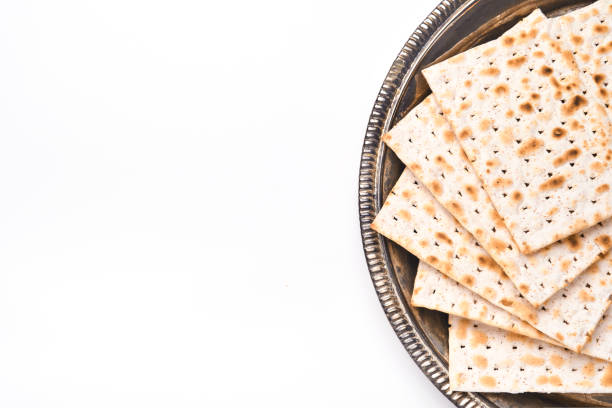Matzah. Traditional ritual Jewish bread on isolated on white background. Passover food. Pesach Jewish holiday of Passover celebration concept. Traditional Jewish kosher matzo. Mock up. Matzah. Traditional ritual Jewish bread on isolated on white background. Passover food. Pesach Jewish holiday of Passover celebration concept. Traditional Jewish kosher matzo. Mock up. kosher symbol stock pictures, royalty-free photos & images