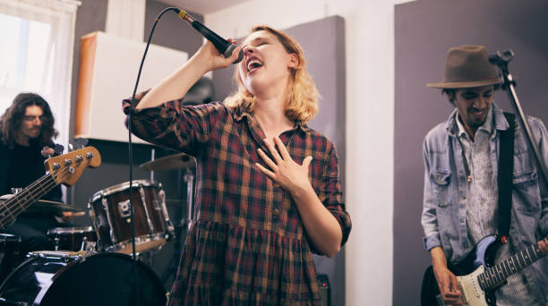 istock Shot of a band practicing at home 1368194983