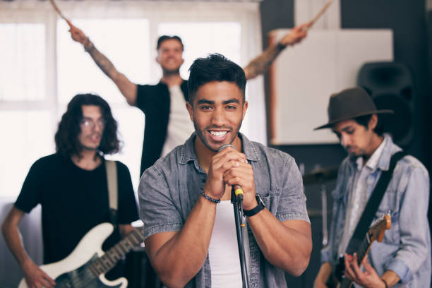 istock Shot of a band practicing at home 1368194992