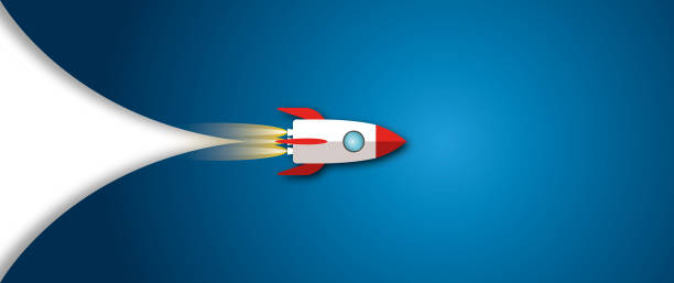 istock Rocket rising up on blue background as metaphor for business and financial growth. 1368195272