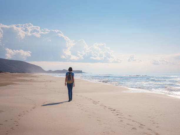 istock Backpacker asian female on Patara sand dunes beach 1368196288