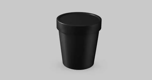 Photo of 3D white and black round container for ice cream, cream or yogurt. Perspective view isolated on gray background. Packaging mockup image.