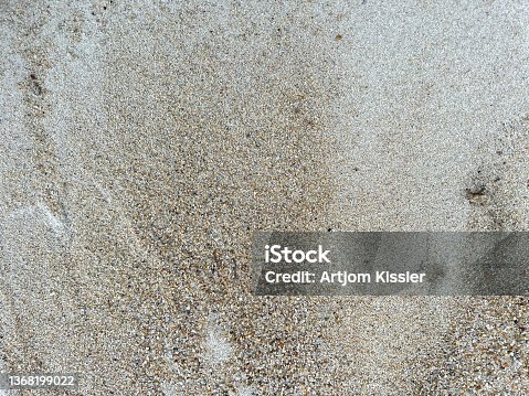 istock Moist sand as texture or background. 1368199022