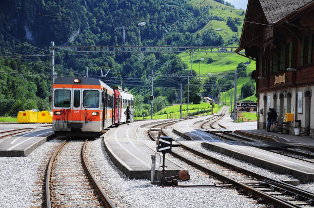 Montbovon, Switzerland - July 15, 2012: Passenger train stands by the platform near Golden Pass.