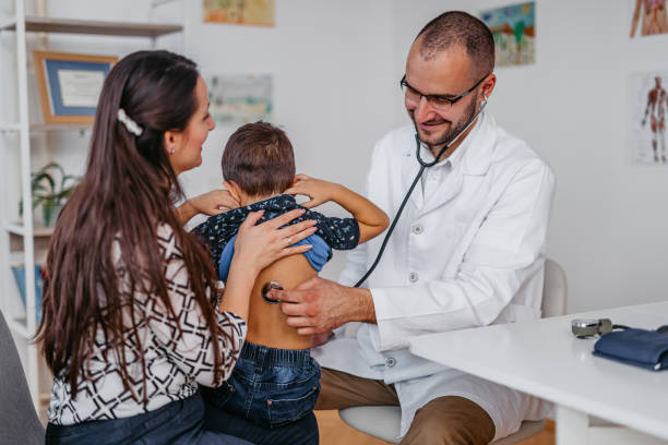 istock Pediatrician Auscultating A Child Patient 1368204692