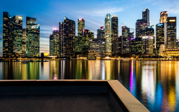 istock Singapore skyline at dusk 1368205506