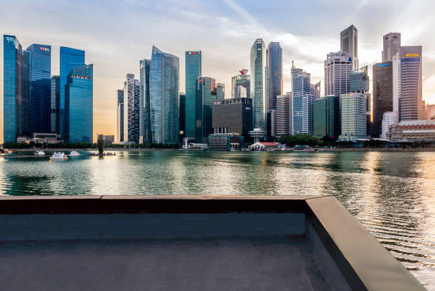 istock Singapore Skyline at sunset 1368205529