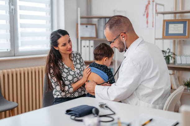 istock Pediatrician Auscultating A Child Patient 1368205649
