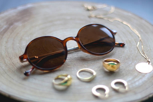 istock Sunglasses and Gold Jewelry 1368212800