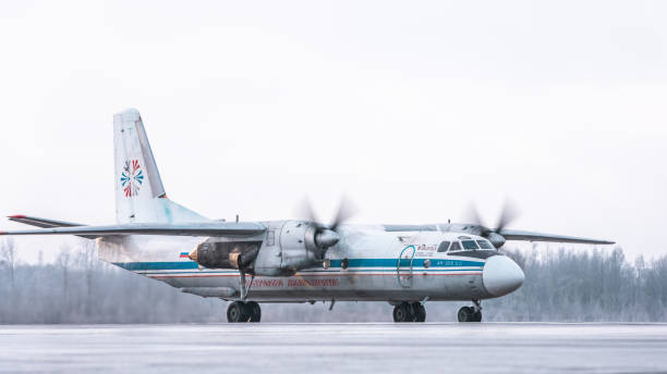 Kostroma Air Enterprise Antonov An-26B Kostroma Air Enterprise Antonov An-26B-100 taxiing. Pulkovo International Airport, Saint-Petersburg, Russia. 26.01.2021 antonov an 26 stock pictures, royalty-free photos & images