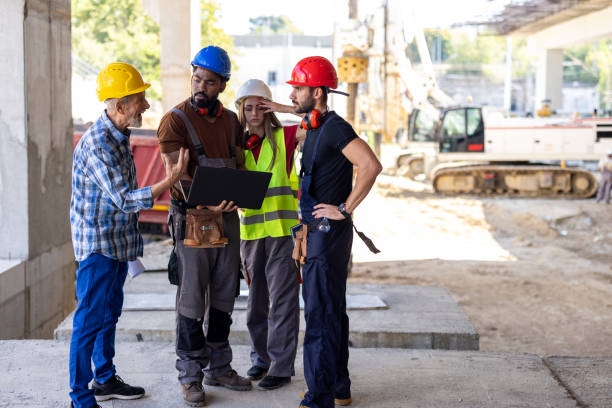 istock A Senior Construction Worker is Analyzing Project Plans with Young Coworkers Using a Laptop. 1368216386
