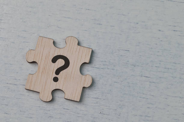 istock Question mark drawn on wooden jigsaw puzzle 1368220806