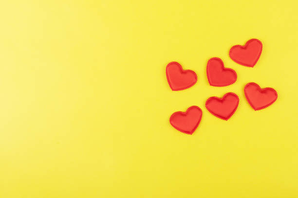 istock Valentine day yellow paper background 1368222035