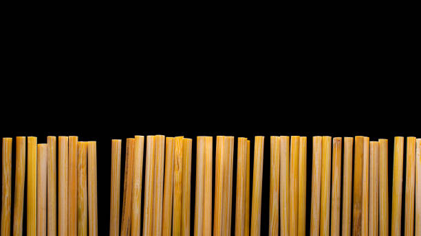 istock wooden palisade on a black background 1368223881