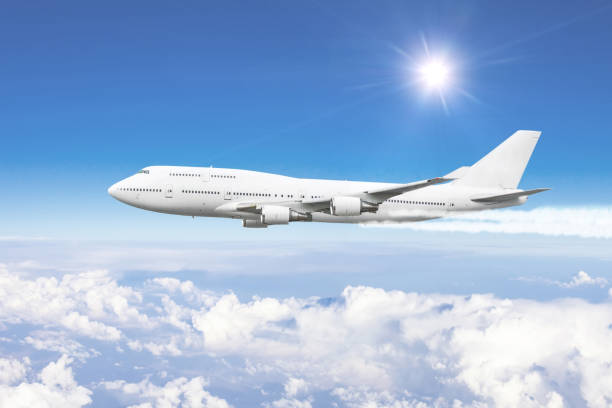 istock Airplane in the sky above the clouds flight journey. 1368227185