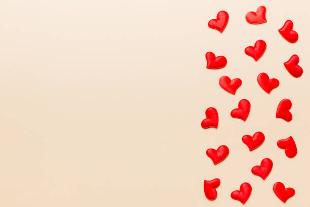 istock Valentine day background with red hearts, top view with copy space 1368228831