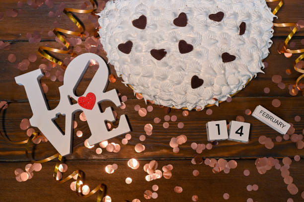 istock Valentine's day cake. the word love. close-up 1368229785