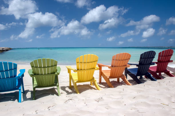 istock Colorful beach chairs on Aruba coast 1368232012