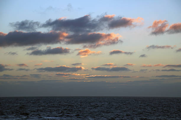 Sunrise over the ocean. Endless expanses on the high seas. beautiful clouds