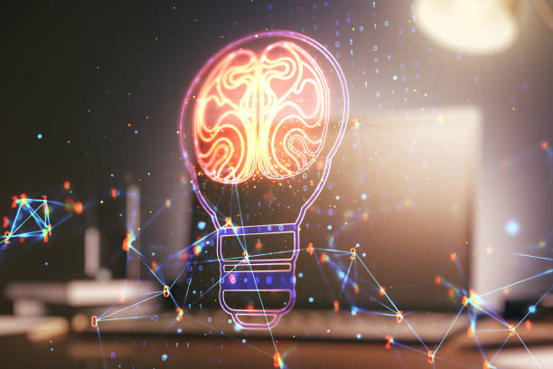 istock Creative light bulb with human brain hologram on modern laptop background, artificial Intelligence and neural networks concept. Multiexposure 1368233865