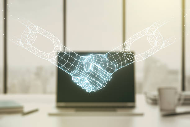istock Creative concept of blockchain technology with handshake on modern laptop background. digital money transfers and decentralization concept. Multiexposure 1368233866