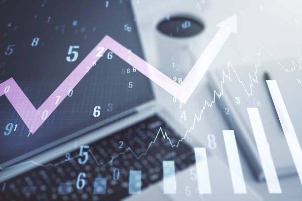 istock Abstract creative financial graph with upward arrow on modern laptop background, forex and investment concept. Multiexposure 1368233867