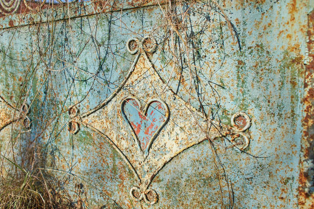Pattern, design of old gate from abandoned house in village on natural background. Old traditional gate from Moldova.