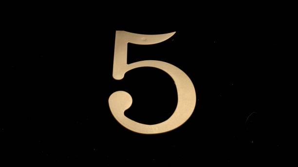 istock Gold numbers on a black background 1368235814