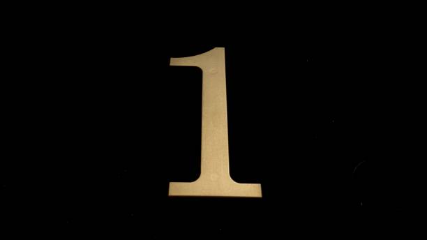 istock Gold numbers on a black background 1368235817
