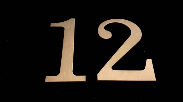 istock Gold numbers on a black background 1368235842